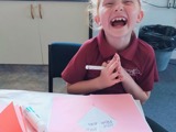 A child laughing at the Tuesday Club Event